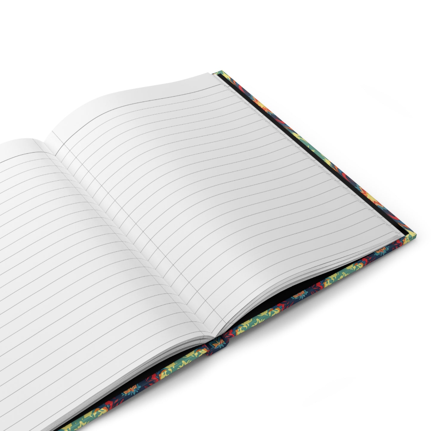 An open African-inspired personalized journal with lined white pages is displayed at an angle on a white background. Its cover edges feature a colorful floral pattern, and the notebook appears new and unused, with no writing on the pages.