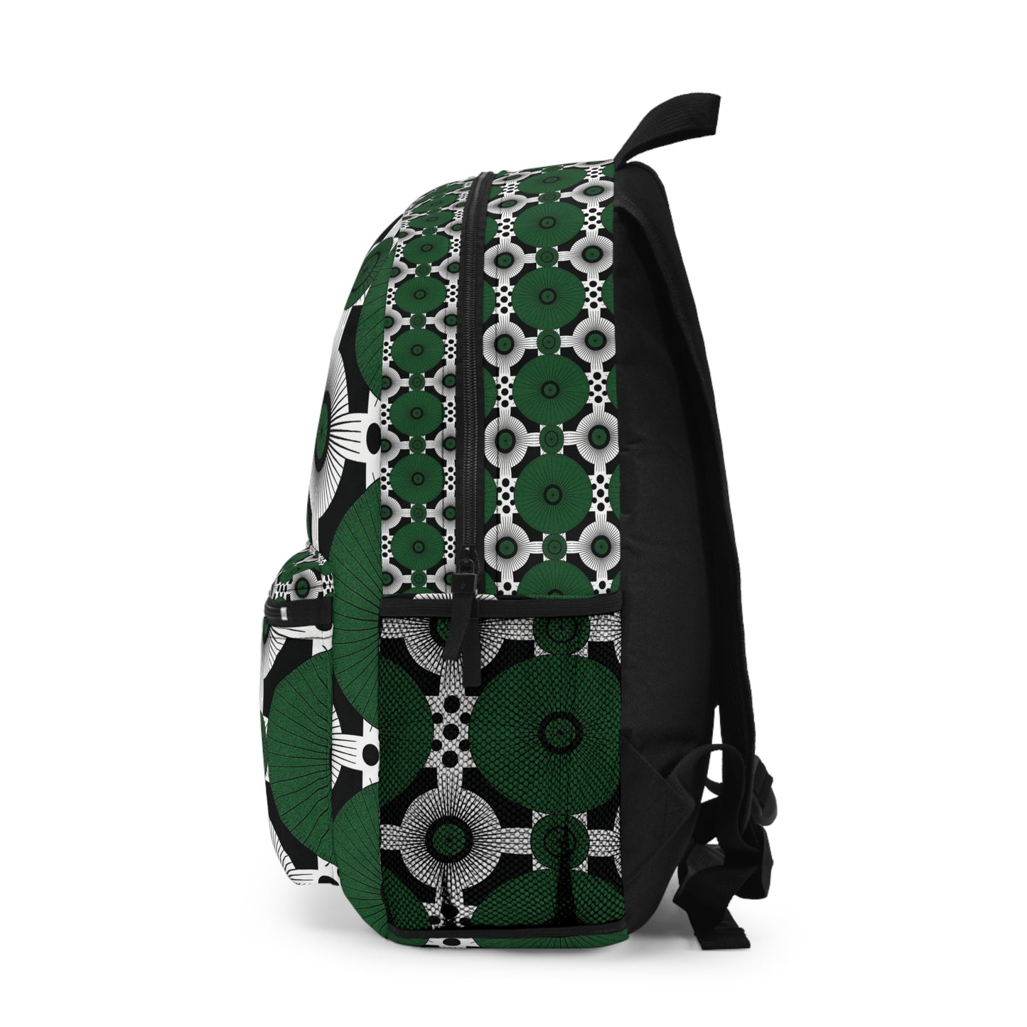 A vibrant backpack with a bold geometric pattern in green, black, and white. This African-inspired backpack features circular shapes and dots, with a black back panel, black straps, and a top handle, shown from a side angle.