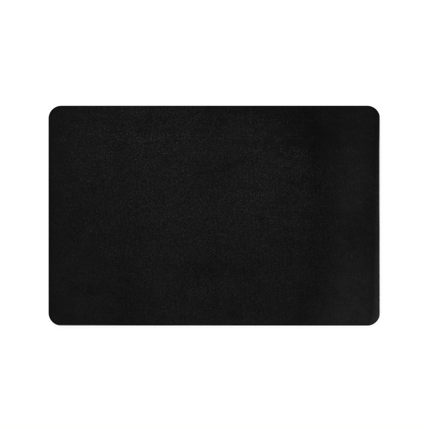 A rectangular black mat with rounded corners is shown on a plain white background. This African-inspired mat has a smooth, even texture and appears to be made of a soft material, possibly rubber or fabric.