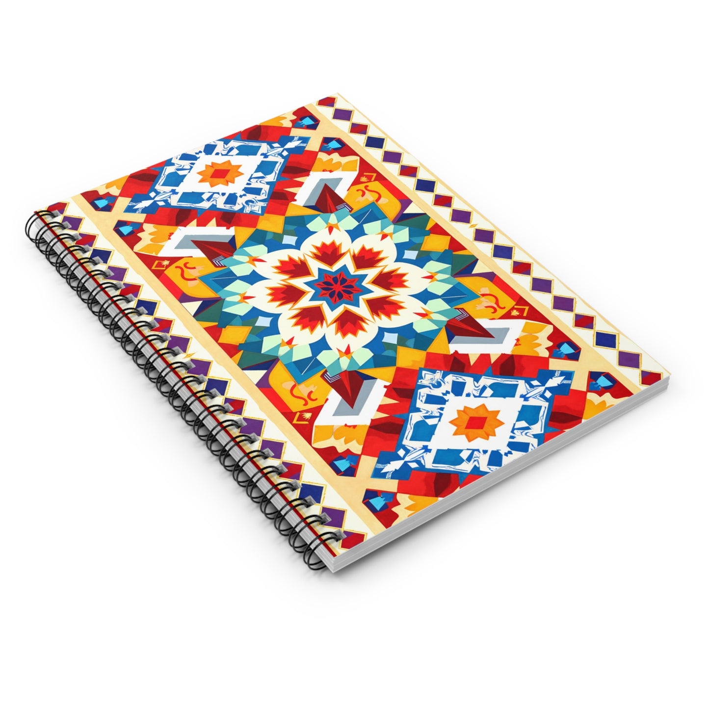A premium writing journal with a vibrant, culturally inspired geometric cover. The spiral-bound notebook features colorful patterns in red, blue, orange, and yellow, with a striking central star motif and bold symmetrical details.