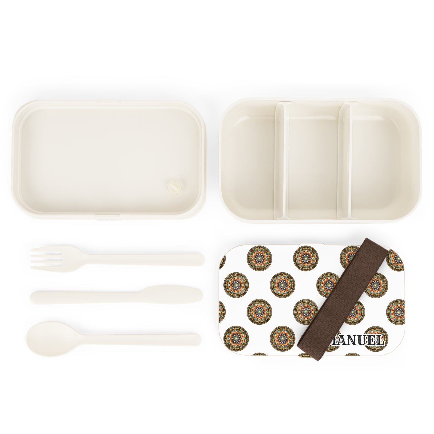A personalized lunch box set, BPA-free, shown open with two compartments and utensils. The lid displays a colorful African-inspired circular pattern, a brown elastic strap, and “MANUEL” printed in black.