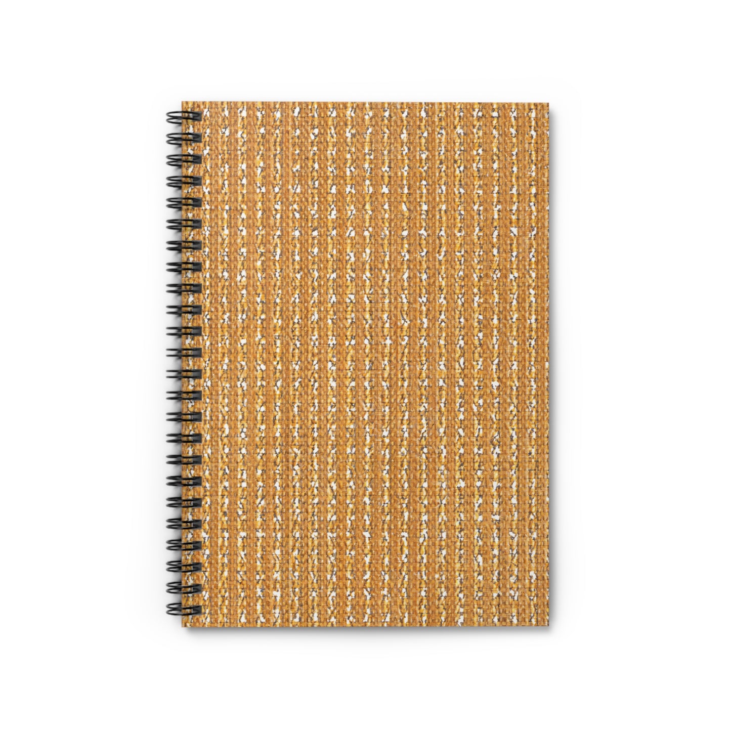 A top-down view of an African-inspired spiral notebook with a textured, woven tan and white cover. The cover features vertical stripes with a subtle shimmer, and the black metal spiral binding is visible on the left side against a white background.