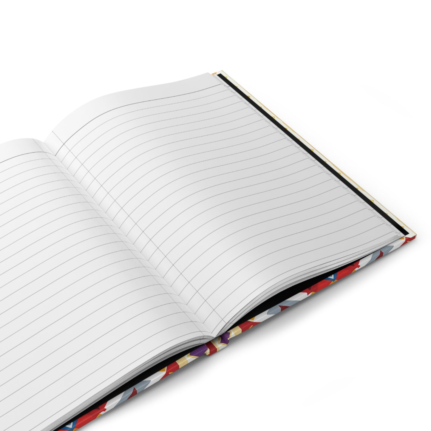 An open, lined African-inspired journal with a colorful patterned cover rests on a white surface. The pages are blank except for horizontal lines, and the notebook is viewed at an angle from above, showing its binding and edges.