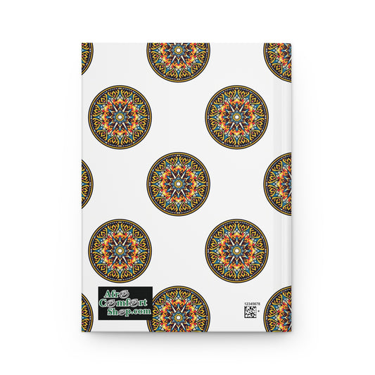 A white African-inspired hardcover journal is decorated with evenly spaced round mandala designs in orange, blue, and green tones. In the bottom left corner, a black AfroComiArt shop.com logo and a small black QR code sit side by side.