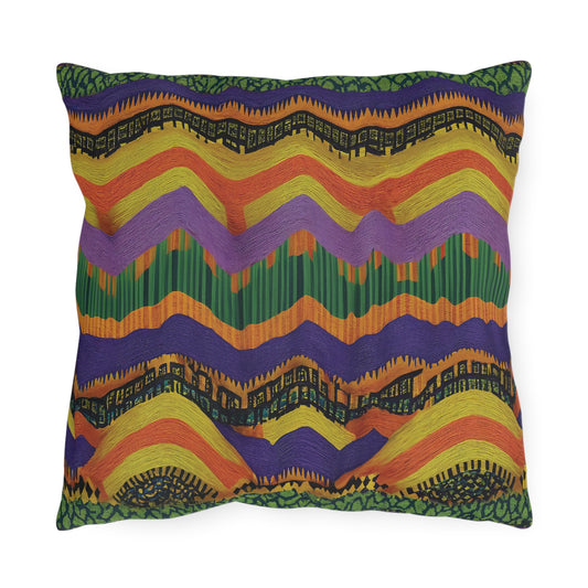 A square outdoor pillow with a vibrant zigzag pattern in green, yellow, orange, and purple hues. Made from UV-resistant fabric, it features wavy lines and textured details with small geometric motifs in coordinating colors.