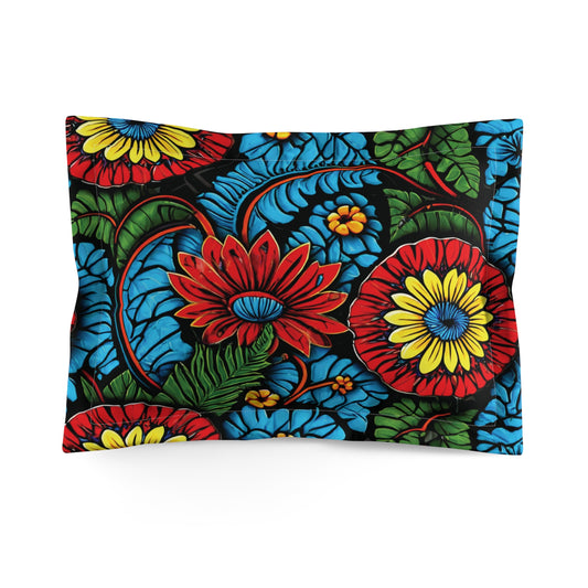 A rectangular luxury pillow sham featuring a bold, colorful floral pattern. Large red, yellow, and orange flowers with intricate blue and green leaves cover soft microfiber fabric, with an envelope closure for a polished, eye-catching look.