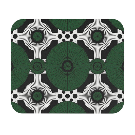 A geometric pattern with large green circles radiating lines, white shapes with black lines, and clusters of black dots on a black backdrop—this African-inspired mouse pad is a durable desk accessory with striking, symmetrical designs.