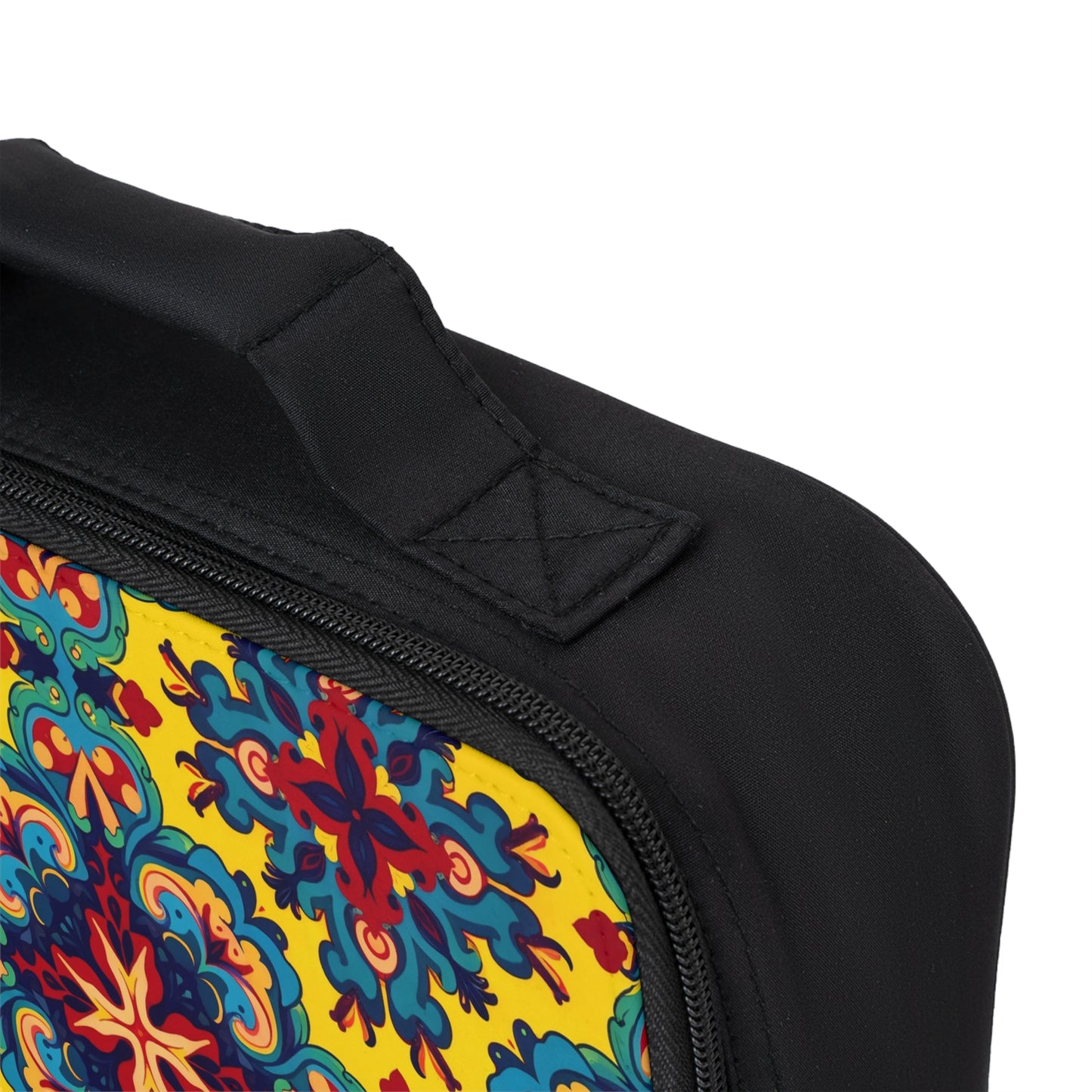 A close-up of an African-inspired lunch tote featuring a handle stitched at the top and a zipper along the edge. The front panel displays a vibrant, multicolored mandala pattern with red, blue, orange, and yellow on a yellow background.