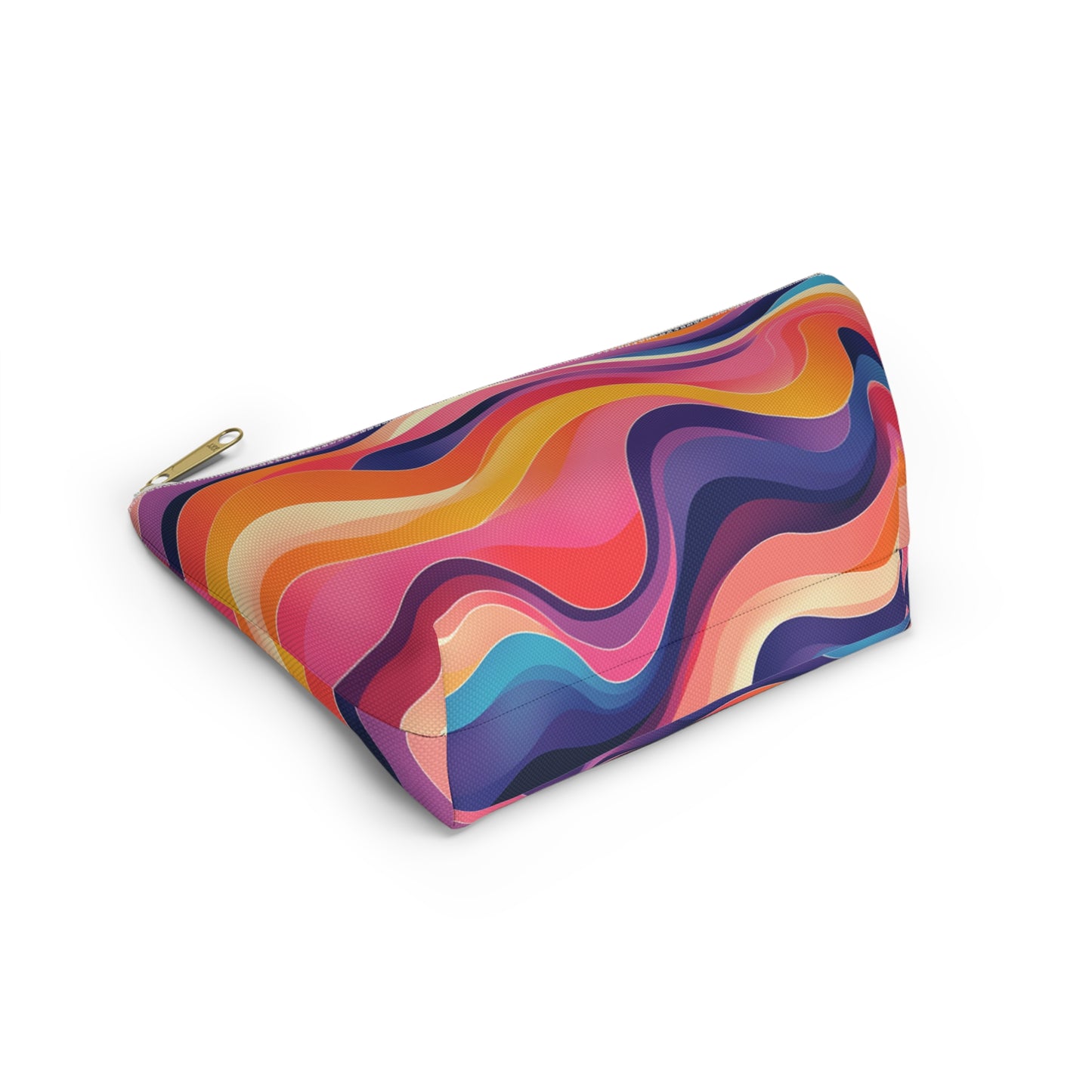 A fabric zippered cosmetic travel bag with a gold zipper features a vibrant wavy pattern of overlapping colors, inspired by African-inspired patterns, creating a dynamic, abstract, and modern design on a white background.