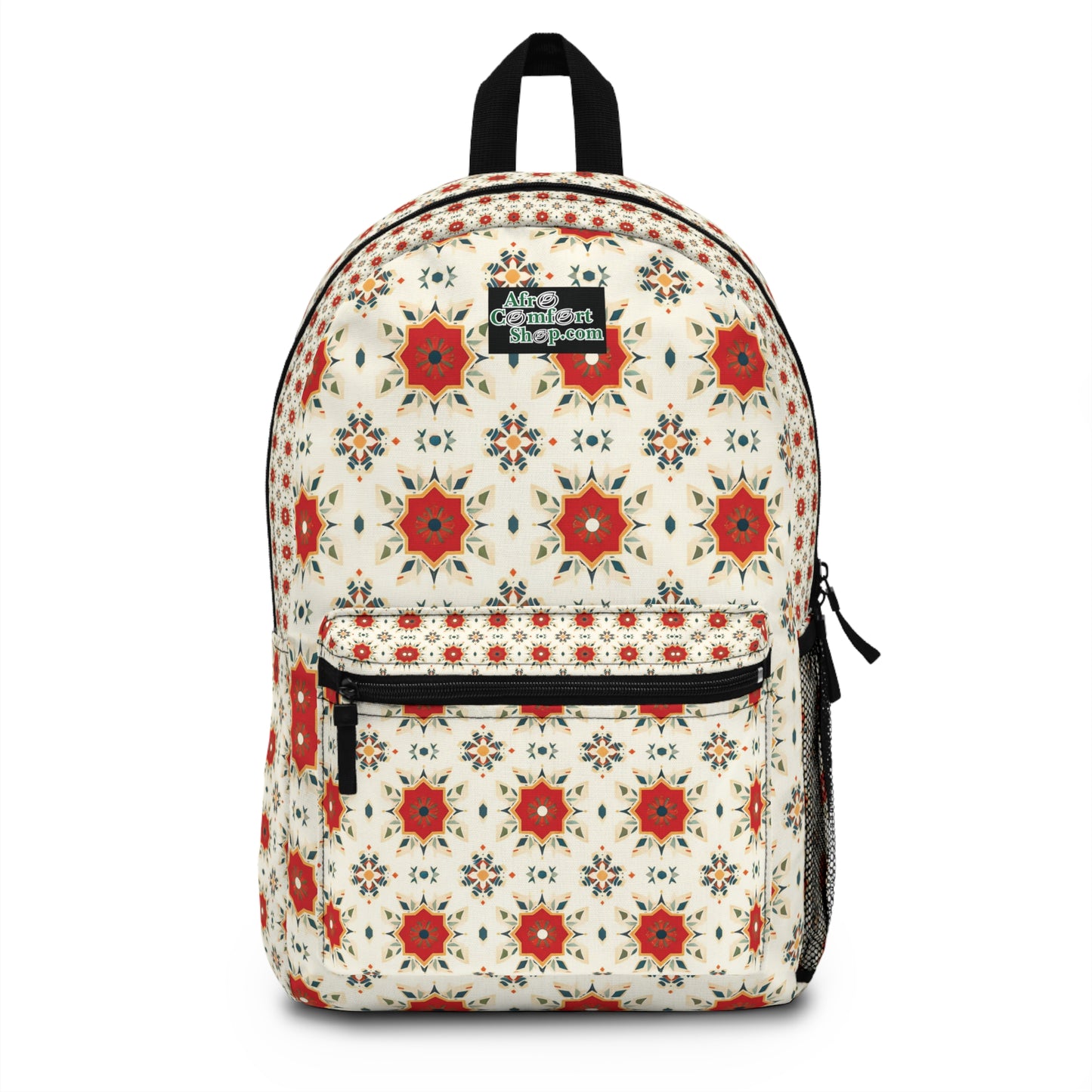 A white African-inspired backpack featuring a repeating pattern of red and orange star-shaped floral designs, with small blue and gold accents. It has a front zippered pocket, side mesh pocket, black top handle, and a black patch label on the front.