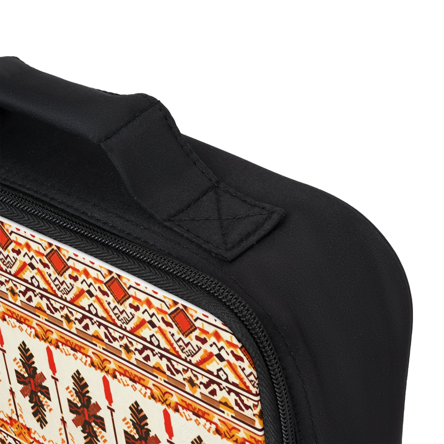 Close-up of an African-inspired lunch tote with a handle and zippered edge. The front panel features a colorful, geometric pattern with brown, orange, and red tribal-inspired shapes on a cream background.