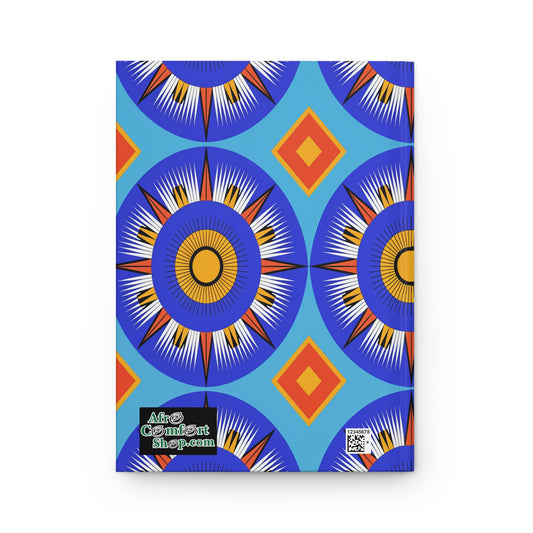 A vibrant African-inspired hardcover journal cover features bold blue, orange, and yellow geometric starburst patterns on a blue background. A small Afro ComiCon logo, QR code, and lined writing journal pages make it bright and eye-catching.