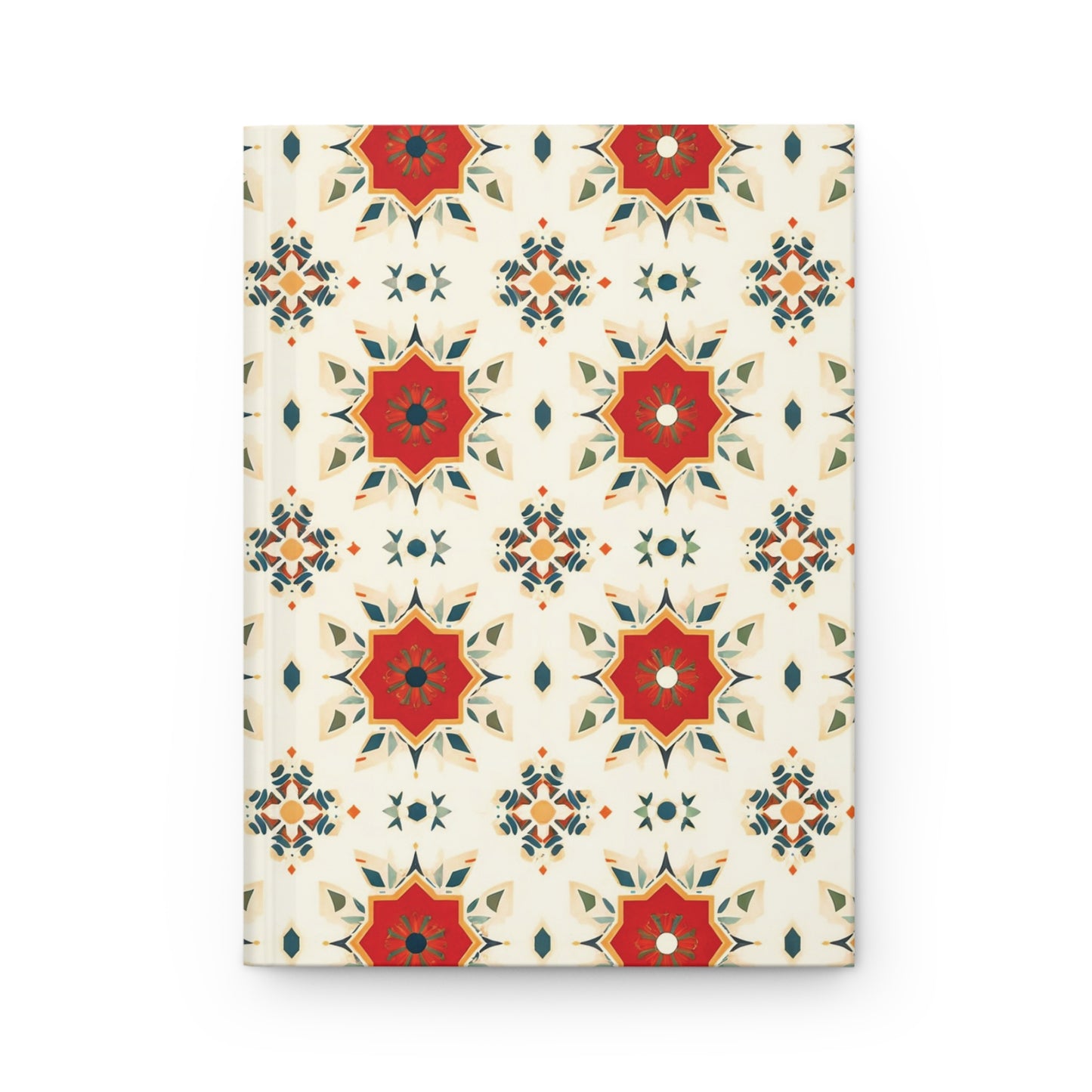 A hardcover wellness journal featuring a repeating geometric pattern of red and gold star shapes, accented with green and dark blue details on a cream background. The ornate, symmetrical design adds a decorative touch to your daily reflections.