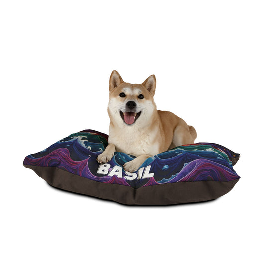 A happy Shiba Inu dog with tan fur lies on a personalized pet bed, its durable construction and swirling blue and purple patterns offering luxurious comfort, with the name BASIL in bold white letters against a plain white background.