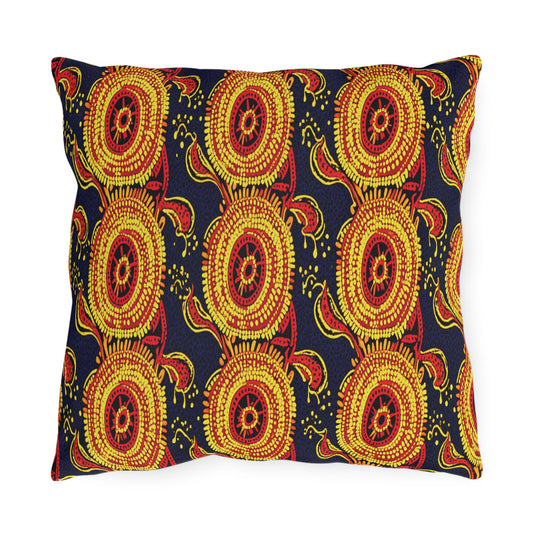 Rectangular outdoor pillow with a vibrant pattern of concentric yellow and red circles and stylized birds on a dark blue, UV-resistant background. The bold, symmetrical design brings traditional decorative charm to your patio or garden.