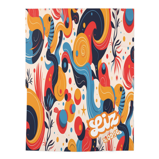 A colorful abstract design with swirling shapes in blue, orange, yellow, and red, plus round dots and wavy lines. Perfect as a personalized baby blanket or baby swaddle blanket. “Liz” and “2.09.16” appear boldly in the bottom right corner.