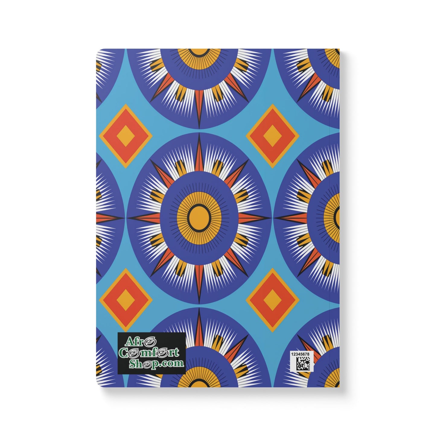A notebook with a blue cover featuring a repeating geometric pattern of circular starbursts in orange, yellow, and navy, with red and orange diamonds between them. Perfect as an African-inspired journal for travel diary or creative journaling.