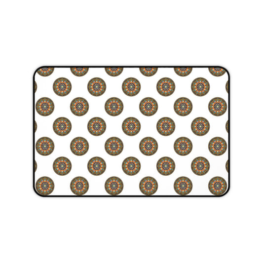A rectangular white Neoprene desk mat featuring a repeating pattern of circular, multicolored mandala designs. Each intricate mandala adds vibrancy, making it a perfect colorful workspace accessory with a thin black outline around the mat’s edge.