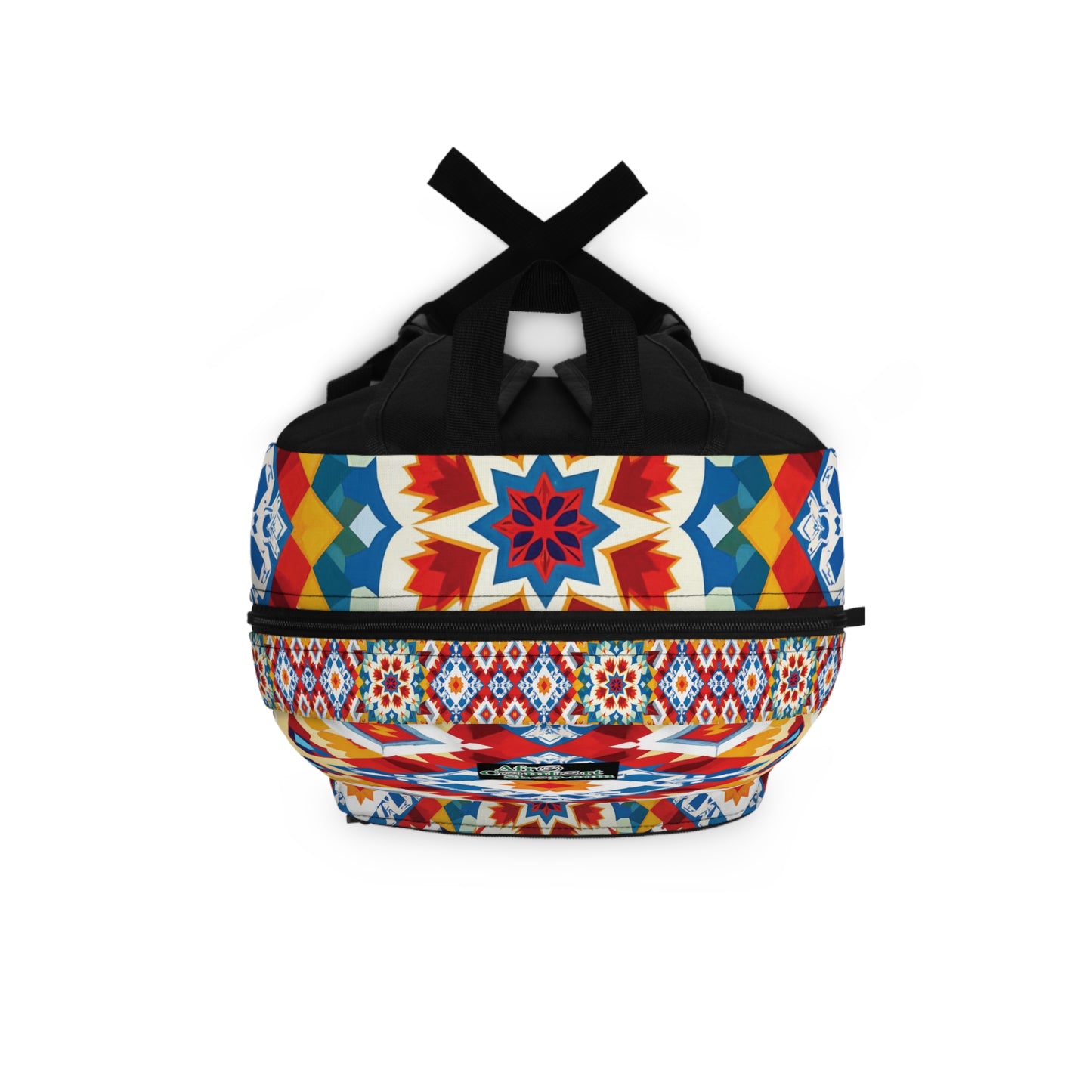 A colorful duffel bag with black handles, featuring vibrant geometric and starburst patterns in red, blue, yellow, and white—echoing the bold style of an African-inspired backpack. Accented by a horizontal band of repeating shapes on a plain white background.