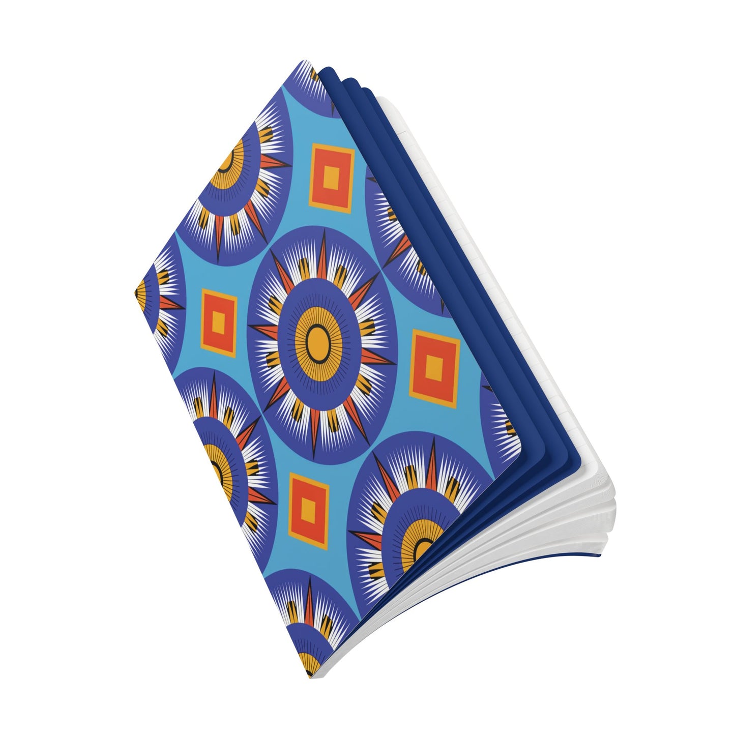 A creative journal with a vibrant geometric cover featuring blue, orange, and yellow circular and square patterns. The book is open, revealing white pages, and is viewed at an angle on a white background.