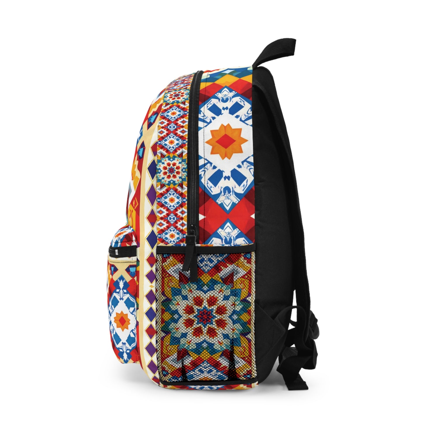 A vibrant patterned backpack shown from the side features geometric patterns in red, blue, yellow, and white. Inspired by traditional tile motifs with star and diamond shapes, this boho chic rucksack has a front pocket and sleek black straps.