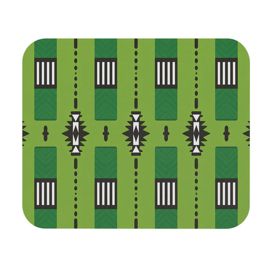 A geometric pattern features vertical green stripes with darker chevron details. Black rectangles with white vertical bars alternate with abstract sunburst shapes along the stripes. This creative desk accessory has a non-slip rubber base and an African-inspired mouse pad design.