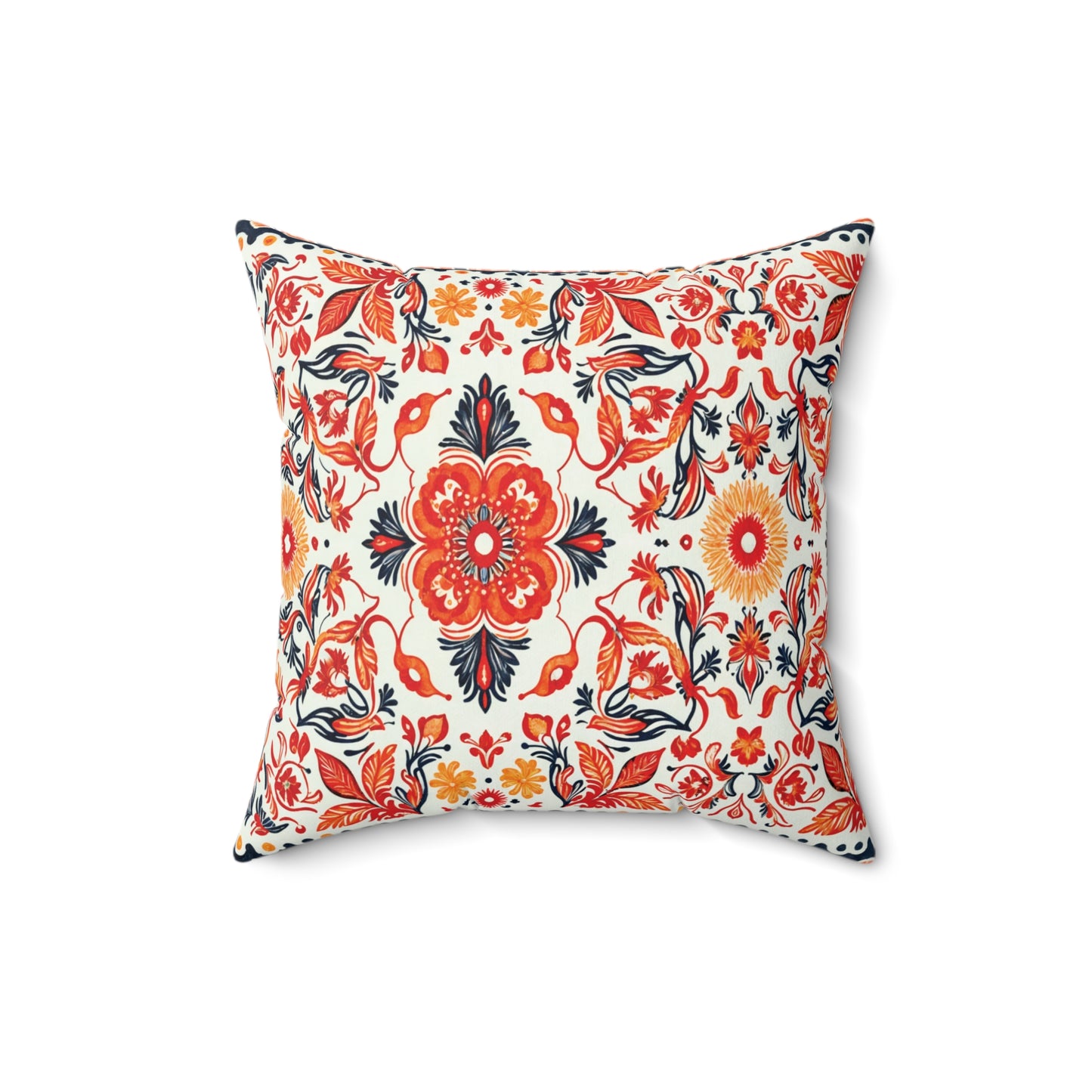 Square decorative throw pillow with a vibrant floral and foliate pattern in red, orange, yellow, and navy blue on white. The symmetrical design features large central flowers and leafy vines, creating a bold African accent pillow for any space.