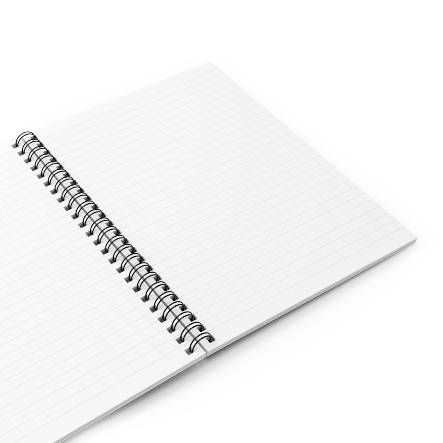 A spiral-bound notebook lies open on a white surface. Featuring culturally inspired designs, the pages are lined and blank, with the spiral binding on the left side. The notebook is positioned diagonally, top right corner further from the viewer.