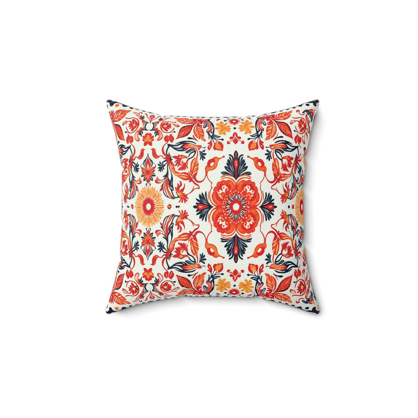 Square faux suede pillow with a vibrant floral pattern in red, orange, yellow, and black on a white background. Symmetrical flowers and leaves create an eye-catching African accent pillow, shown against a plain white backdrop.