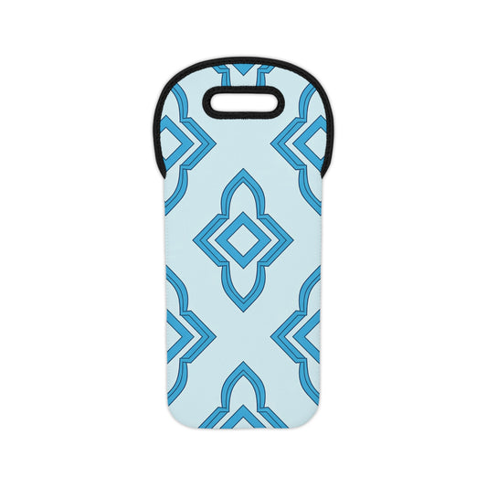A neoprene wine tote with a black-trimmed handle and a repeating geometric pattern in shades of blue on light blue. This insulated bottle holder features diamond and pointed shapes, giving it a modern, stylish look.