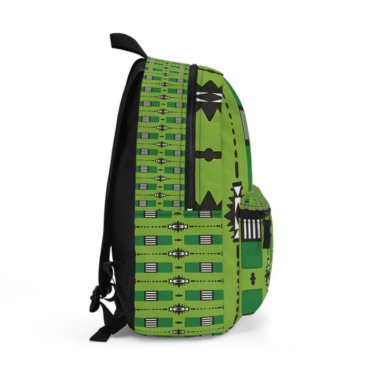 A green African-inspired backpack viewed from the side, featuring bold geometric patterns in black and white. Arrows, rectangles, and lines form horizontal rows. The bag has a front zippered pocket, side pocket, and black shoulder straps.