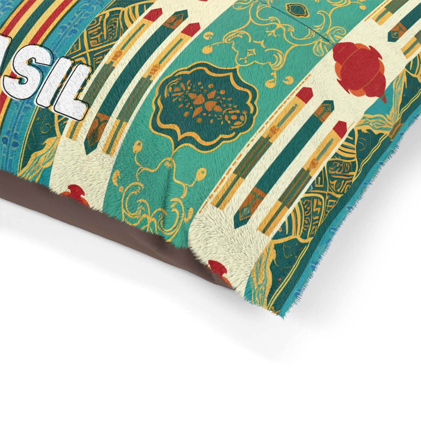 A close-up of a patterned pillow with colorful, vertically striped designs in teal, yellow, red, and gold. Showcasing luxurious comfort and a fuzzy edge, its ornate motifs highlight durable construction. The partial word SIL appears in bold white letters on the left side.