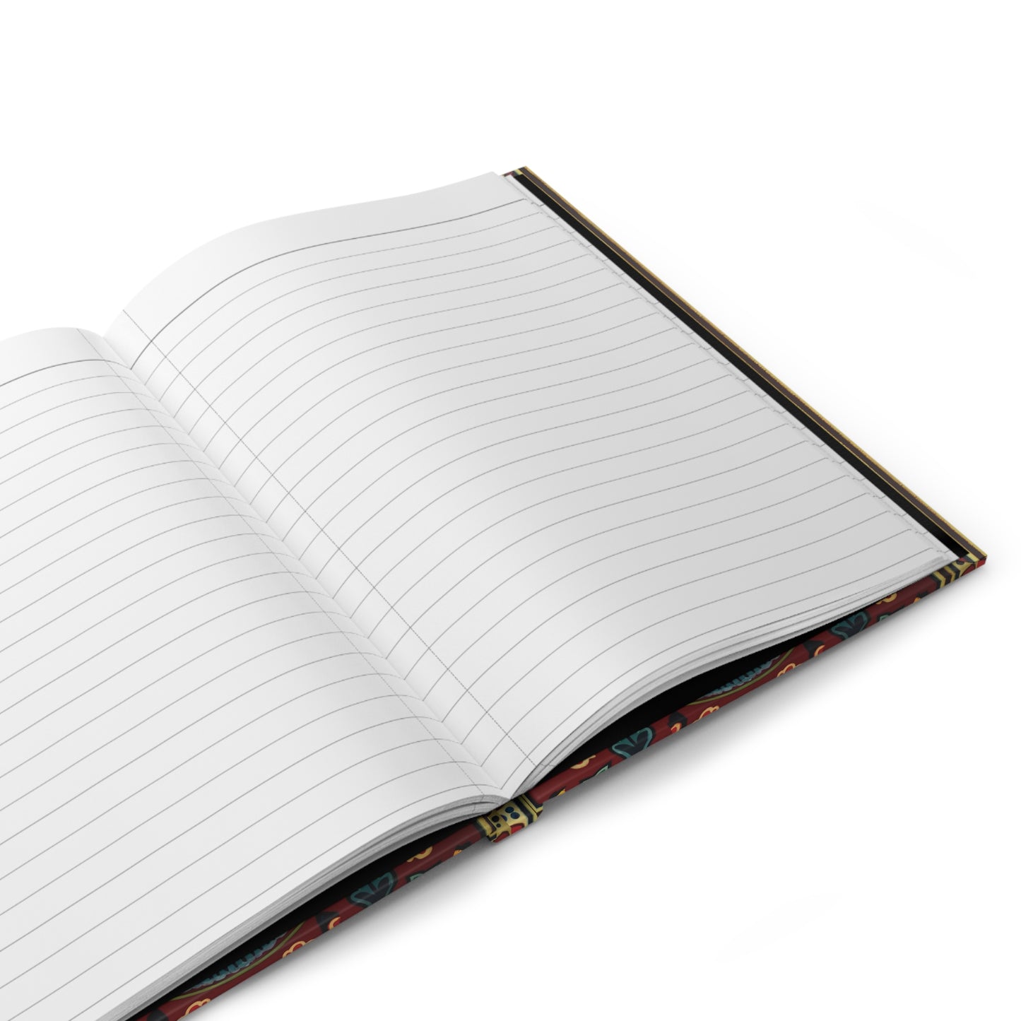 An open, lined writing journal is shown at an angle on a white surface. The pages are blank, and the cover features a decorative pattern with red, blue, and yellow accents along the edge. The notebook is ready for writing.