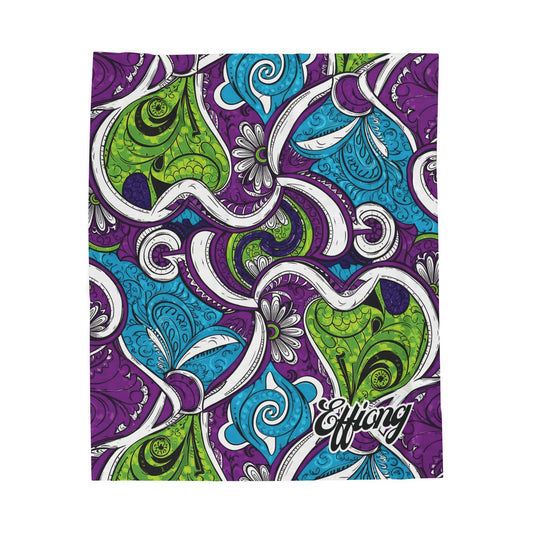 A vibrant abstract pattern featuring swirling shapes in green, purple, and blue with white accents. This African-inspired blanket is busy with paisley and floral elements. In the lower right corner, Effiang appears in a stylized script.