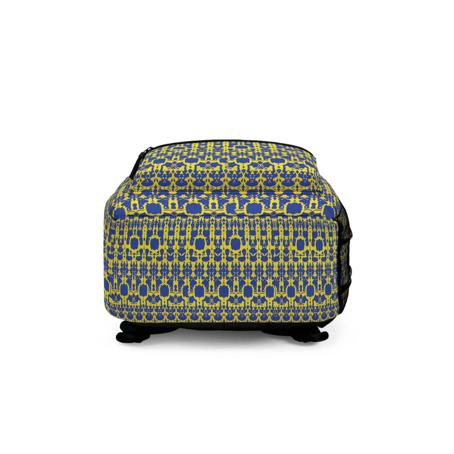 A rectangular suitcase with black wheels, featuring a bright yellow and blue geometric pattern inspired by African-inspired backpack designs. The repeating interconnected shapes cover all sides. The suitcase is viewed from the front, set against a white background.