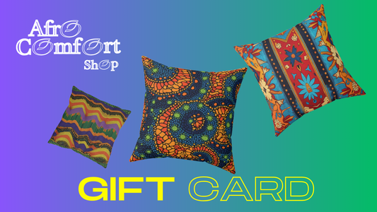 A digital gift card for Afro Comfort Shop features three vibrant pillows with colorful African patterns. Enjoy instant delivery of digital gift cards, perfect for exploring unique products. “Afro Comfort Shop” appears in white decorative text above “GIFT CARD.”.