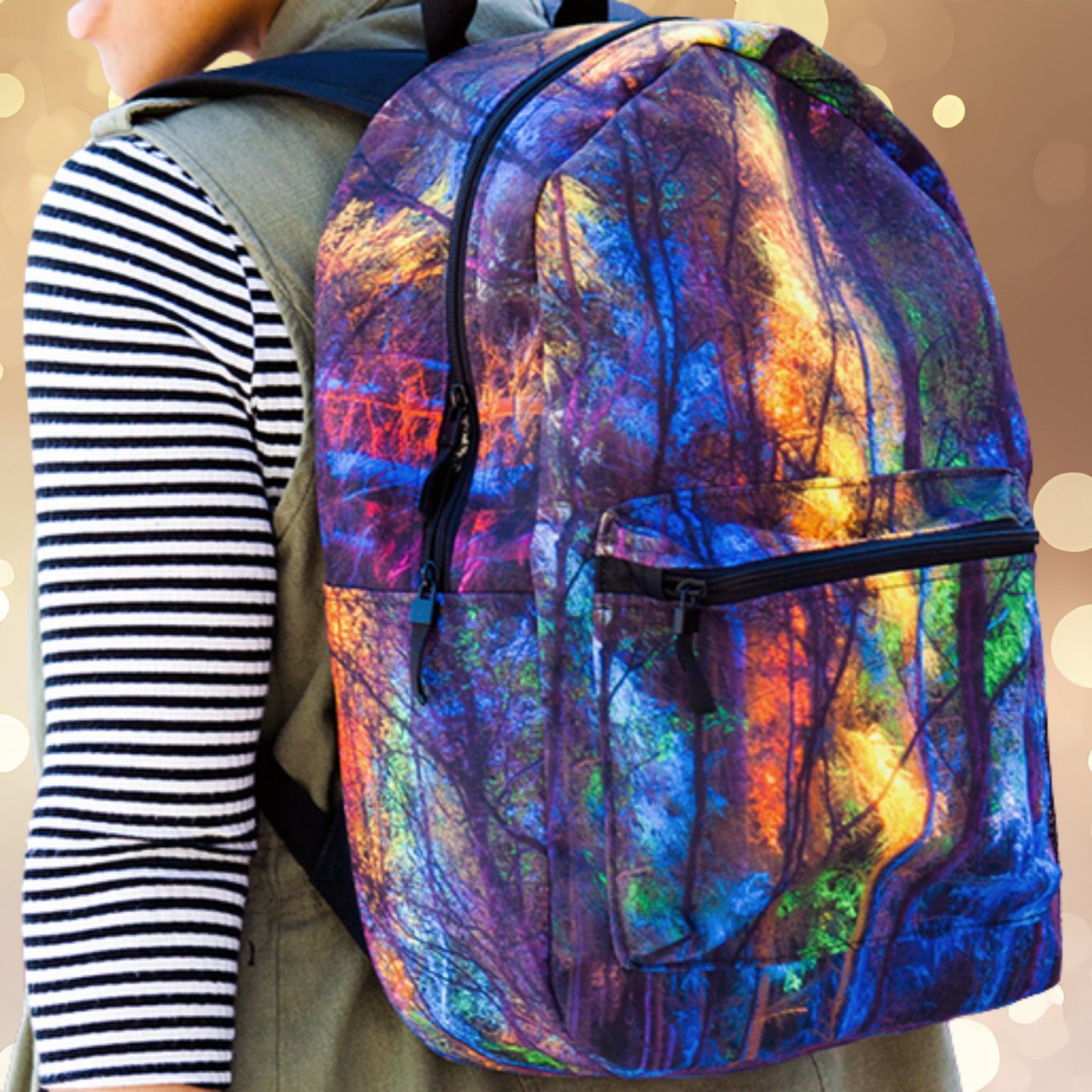 A person wearing a striped shirt and olive vest is seen from the side, carrying a vibrant backpack with an abstract tree or forest pattern. The background is softly blurred with glowing circular light effects.