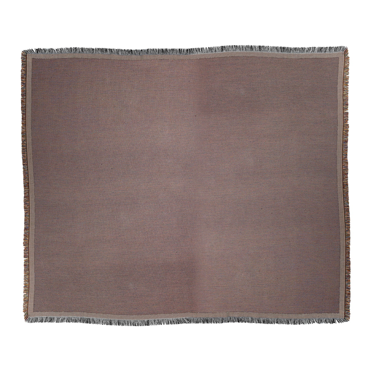A rectangular, flat-weave woven blanket with a muted brown color and fine texture. The edges feature short, multicolored fringe, mainly white and brown. The vibrant throw blanket is neatly laid out on a plain white background.