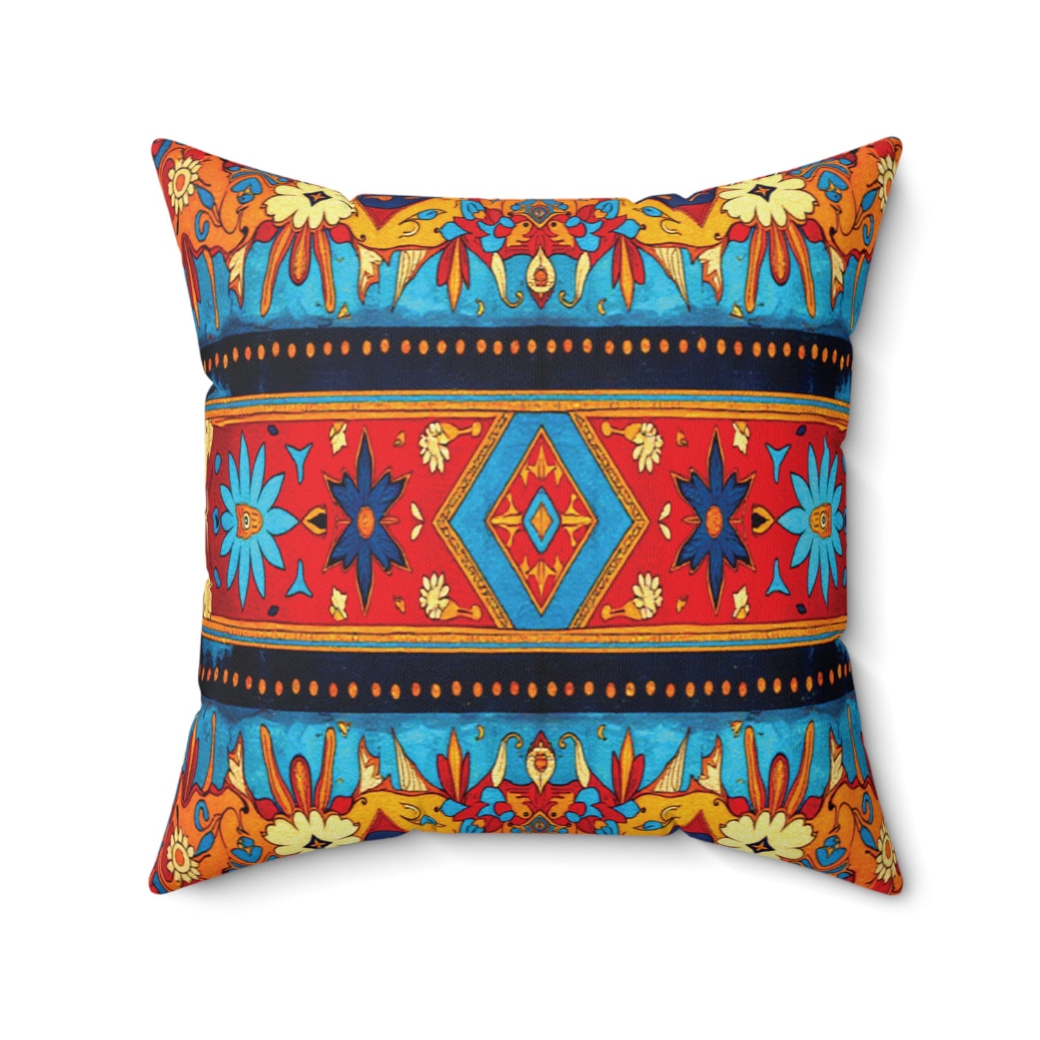 Square pillow with a colorful geometric and floral pattern; features red, blue, yellow, and orange sections with symmetrical diamond shapes and stylized flowers on a white background.