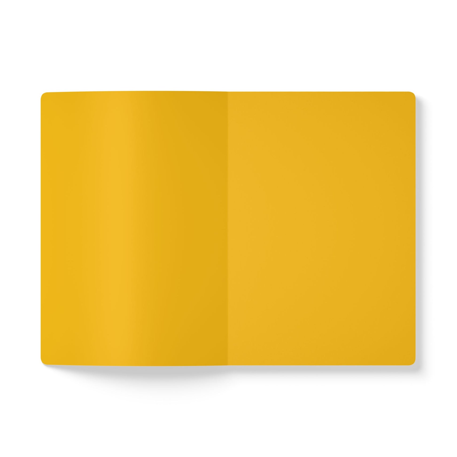 An overhead view of an open creative notebook with blank, bright yellow pages. Centered on a white background, this notebook is perfect for daily journaling, with a soft light casting a gentle shadow at the bottom left edge.
