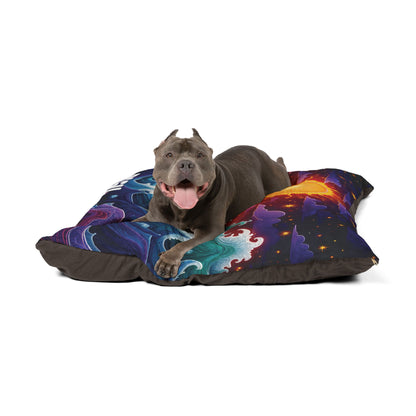 A happy gray pit bull with cropped ears and a pink tongue out lies on a colorful dog bed. The vibrant bed, resembling a cosmic landscape, boasts durable construction for luxurious comfort. The background is plain white.