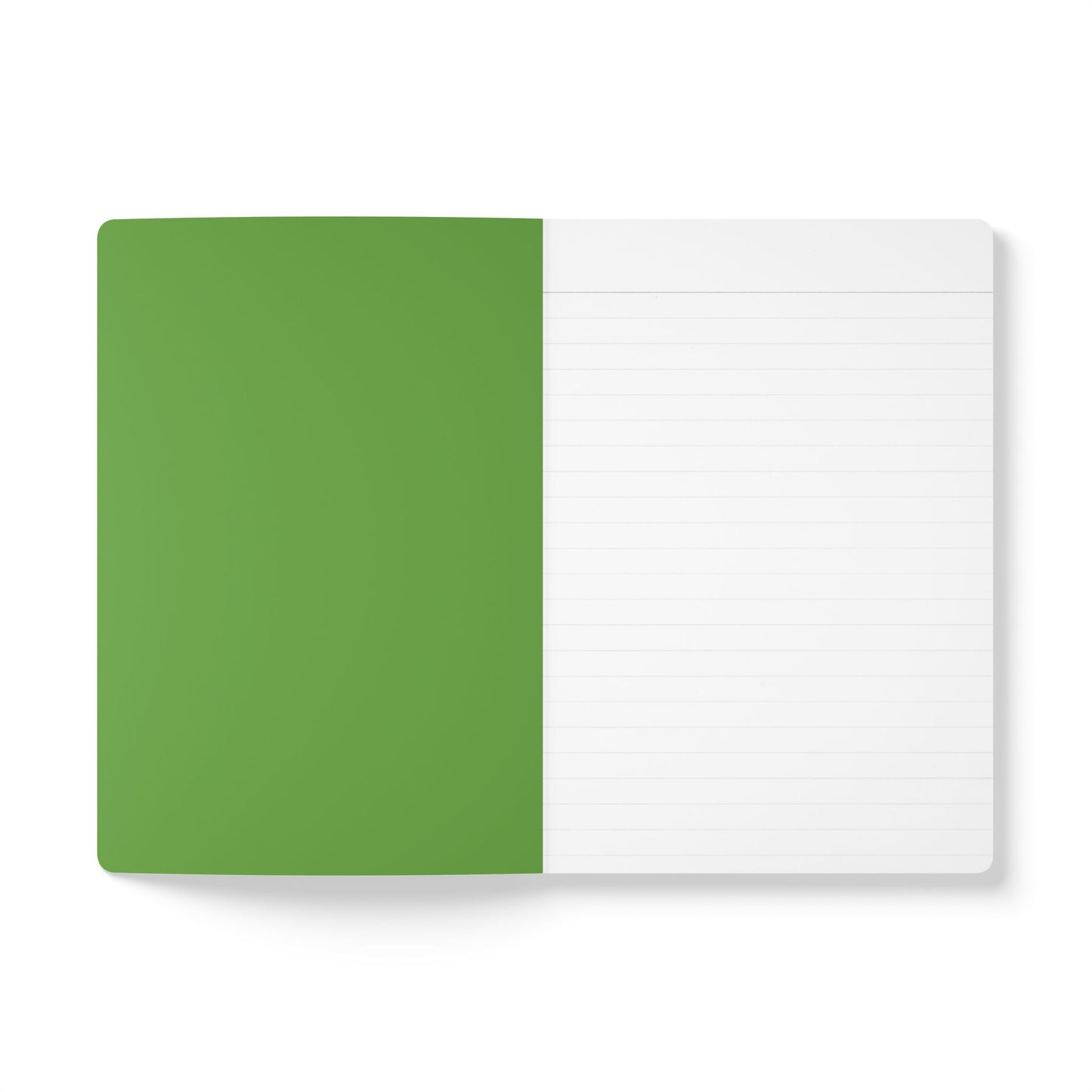 An open creative journal lies flat. The left page is solid green with no writing, while the right page is white with faint gray lines. The background is plain white, and the notebook has rounded corners. Perfect for daily journaling.