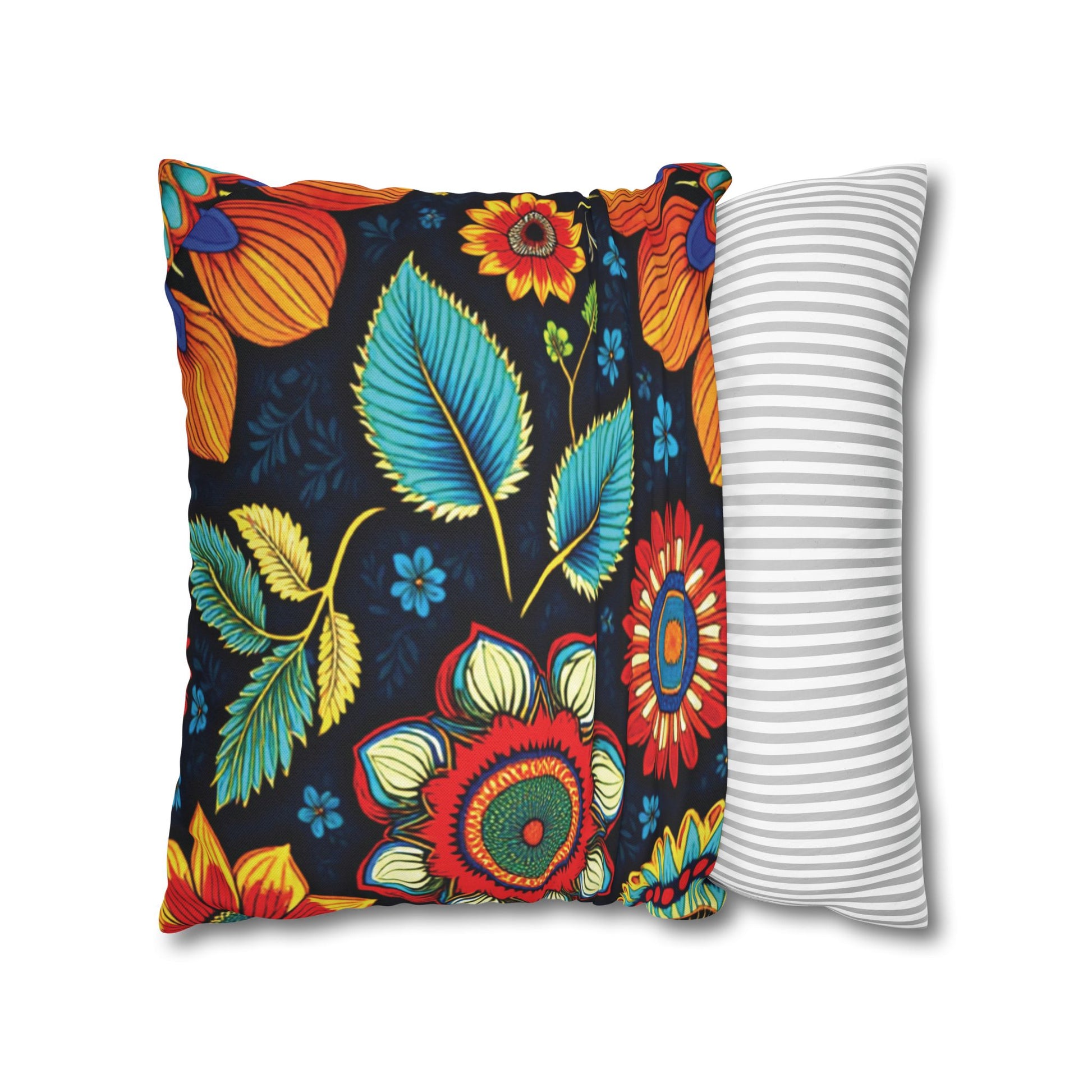 Two pillows side by side: one with a colorful floral print reminiscent of African patterns on a dark background, featuring red, blue, yellow, and green flowers; the other with a simple pattern of horizontal light gray and white stripes.