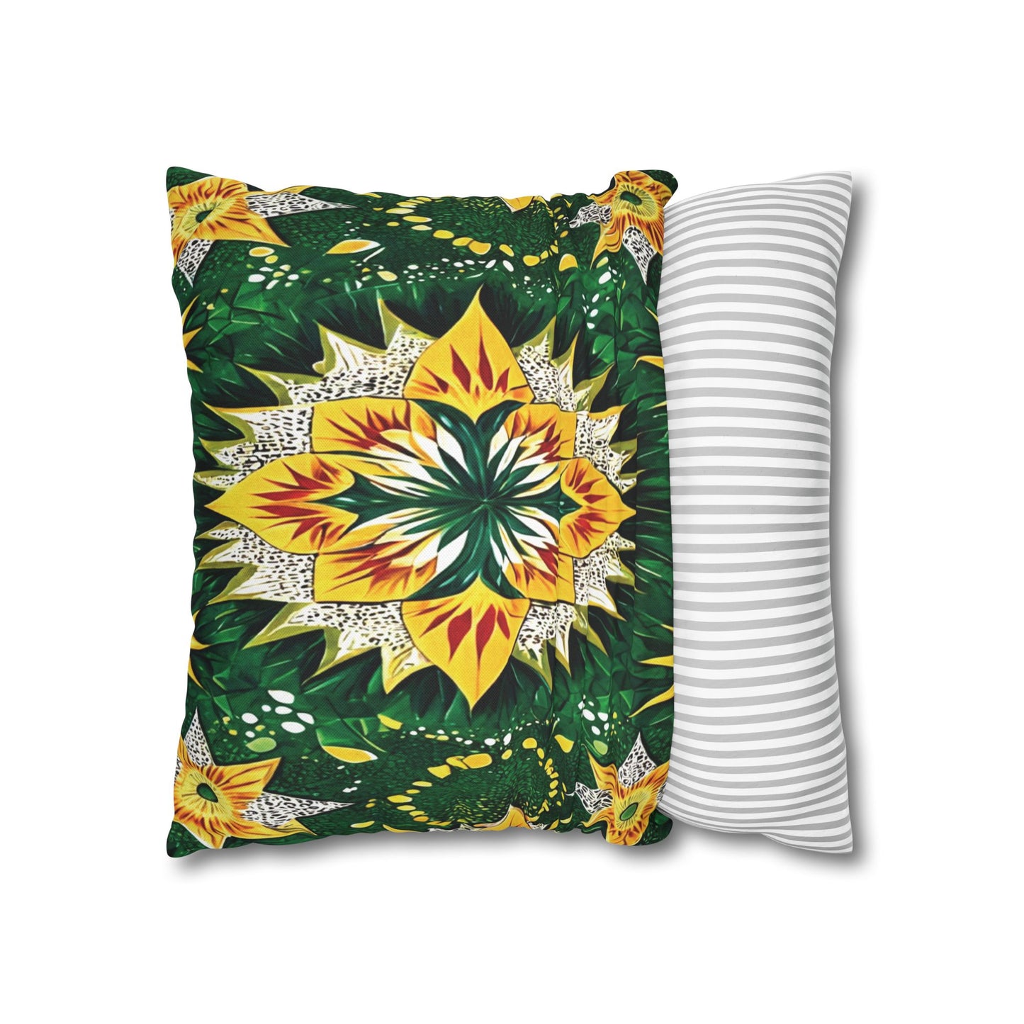Two pillows overlap: the front pillow showcases a vibrant, symmetrical floral pattern with yellow, green, and orange hues inspired by African pillowcases; the back pillow is white with simple, evenly spaced horizontal gray stripes. Both are set against a white background.
