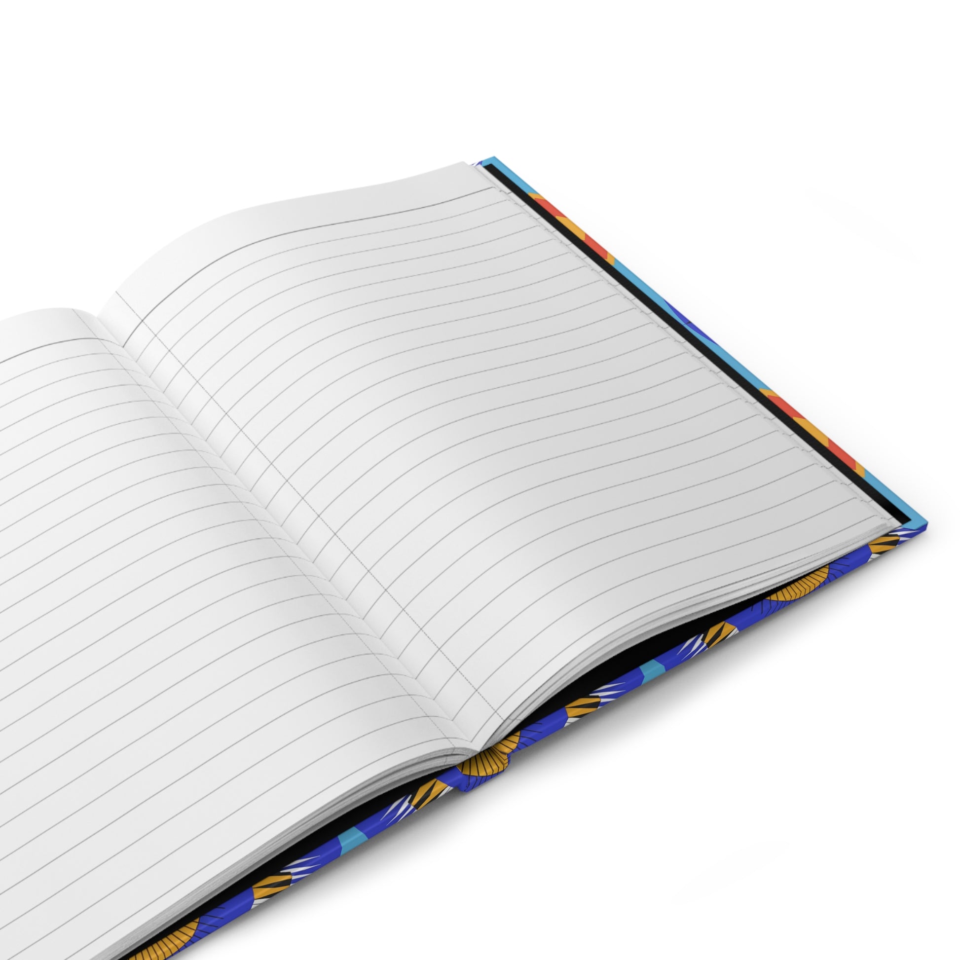 An open African-inspired notebook with a colorful, patterned cover featuring blue, yellow, and orange designs. The pages are blank and white with horizontal grey lines. The lined writing journal is angled on a white surface with its spine visible on the right side.