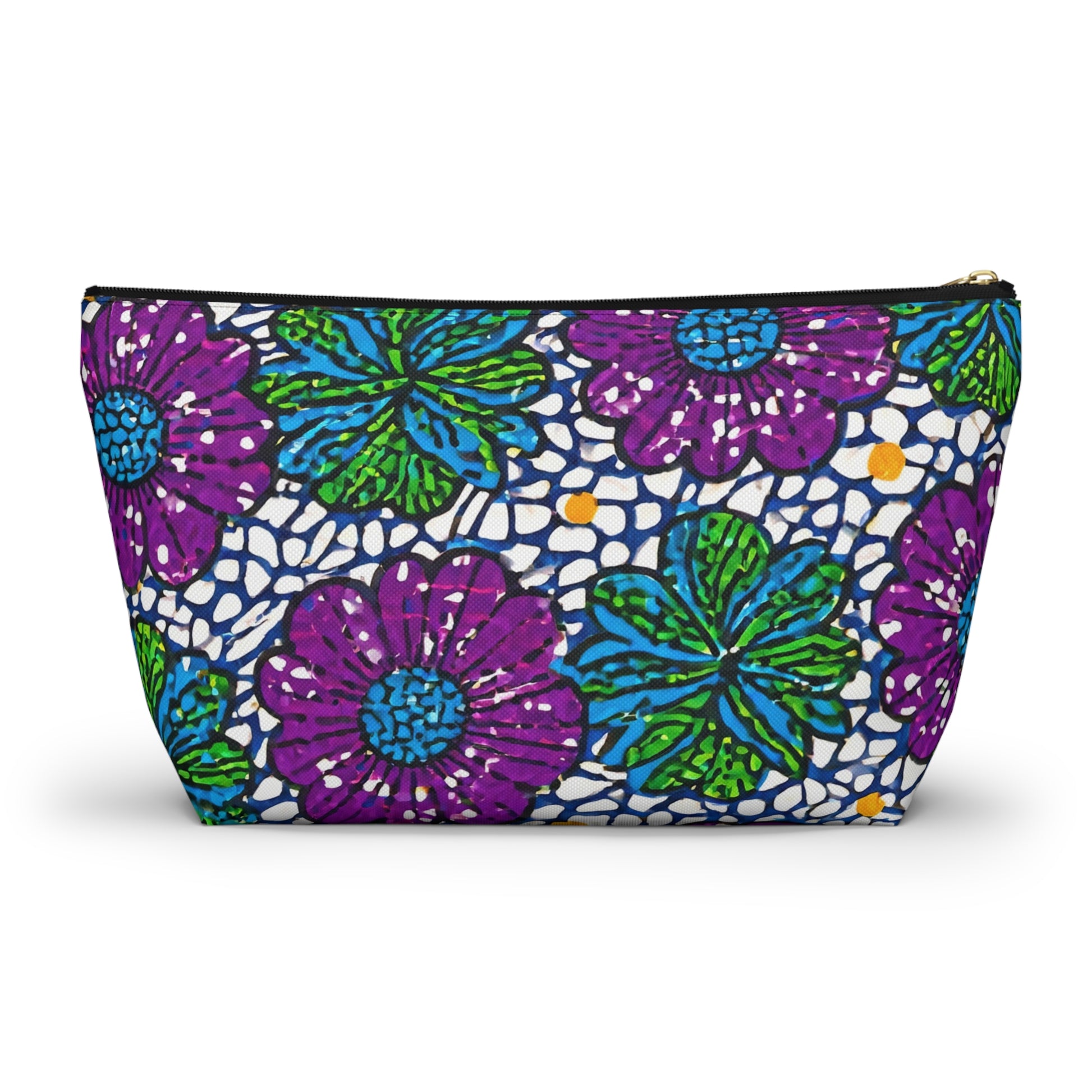 A zippered T-bottom pouch featuring a bold, colorful floral pattern with large purple and green flowers, blue leaves, scattered yellow dots, and a black mosaic-like overlay draws inspiration from African-inspired patterns. Black zipper with gold pull tab.