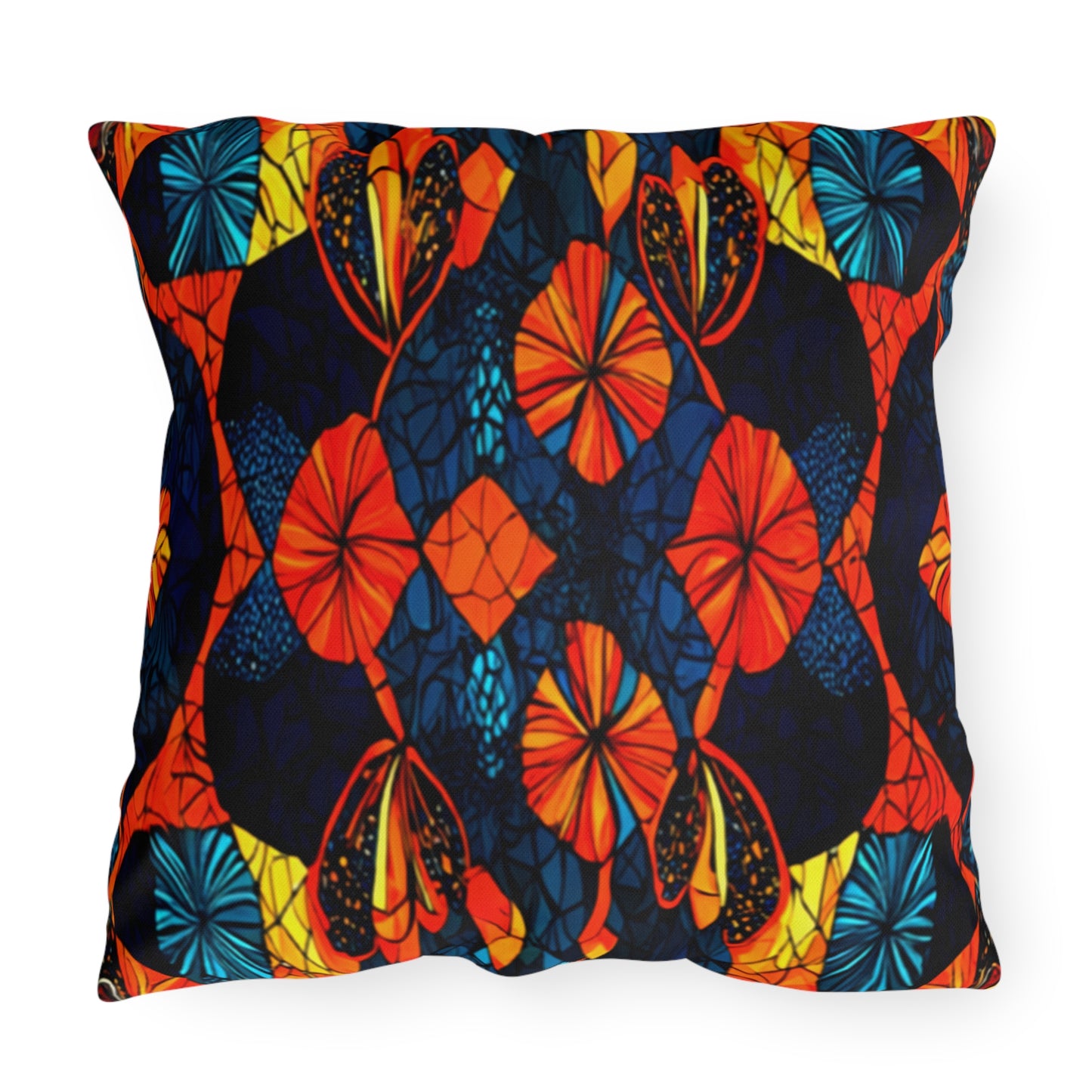 This UV-resistant, water-resistant outdoor pillow features a vibrant abstract pattern with orange, red, blue, and yellow floral and leaf shapes against a dark background, creating a bold and colorful symmetrical design with bright, contrasting colors.