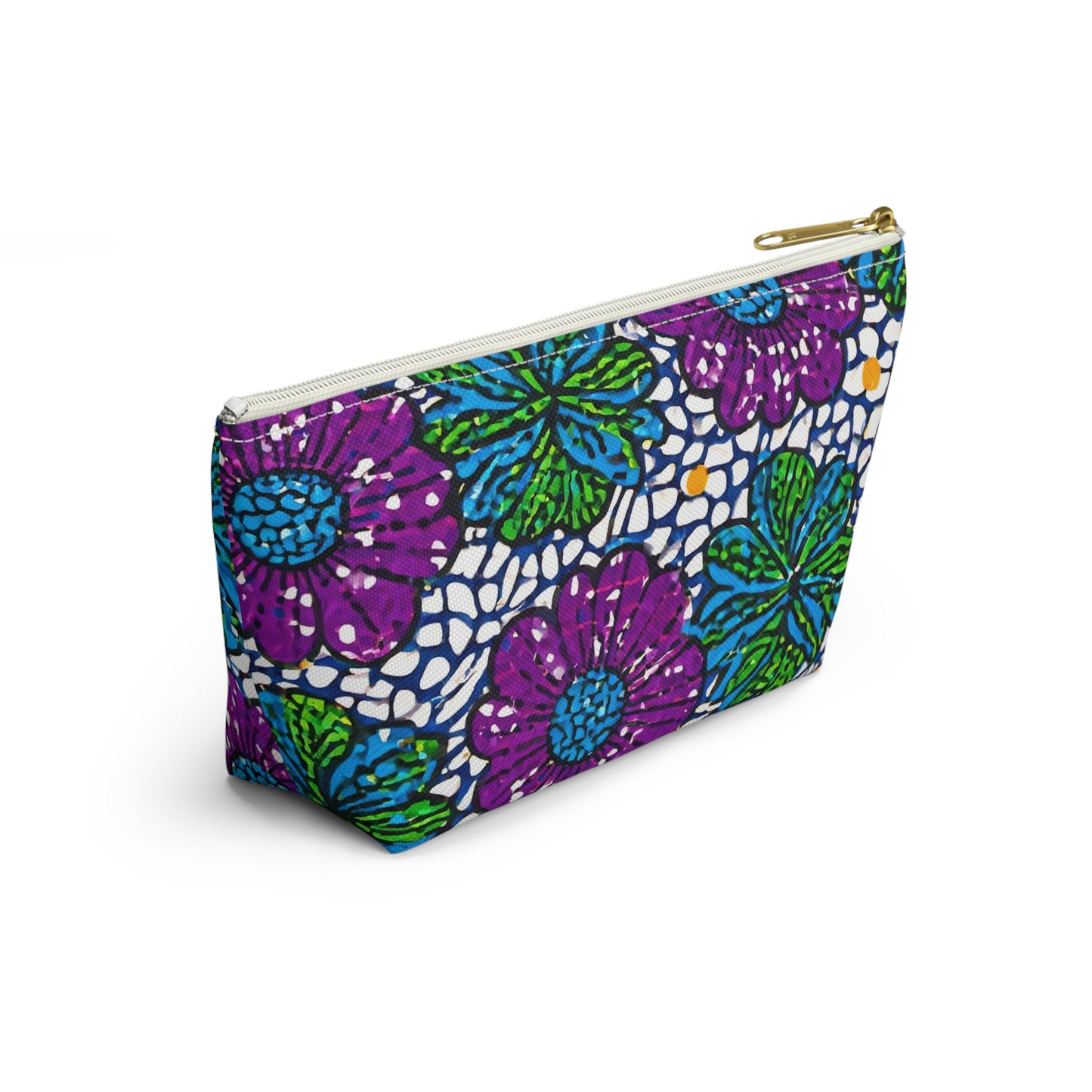 A zippered fabric T-bottom pouch with a vibrant, African-inspired floral pattern featuring large purple flowers and green leaves on a white background with blue and yellow accents. The gold-colored zipper adds elegance to this stylish cosmetic travel bag.
