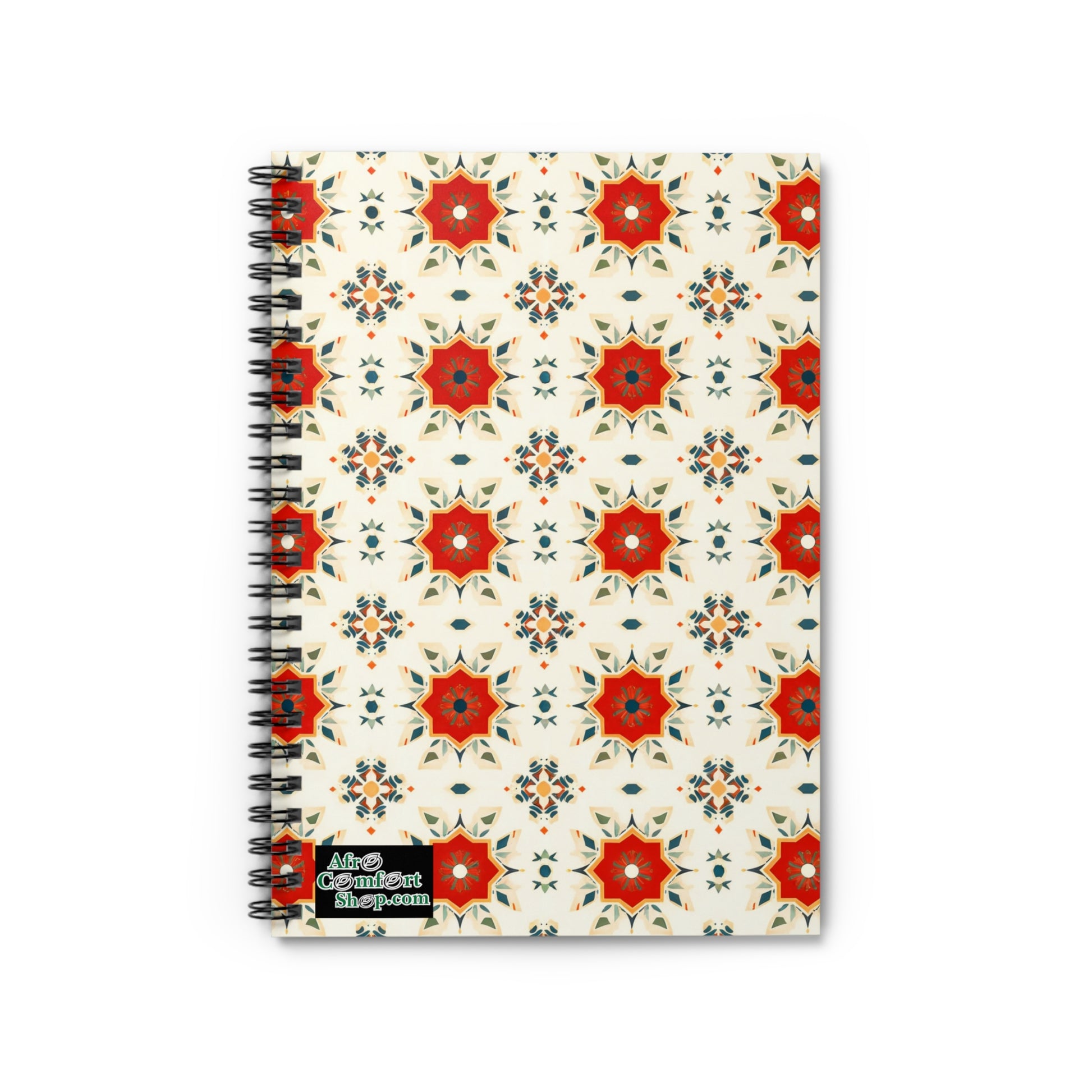 A spiral-bound, African-inspired notebook with a cream cover adorned in red and gold starburst patterns. A small black label in the corner reads “Aline Gabai Art shop.com” in white and green—perfect as a culturally inspired notebook.