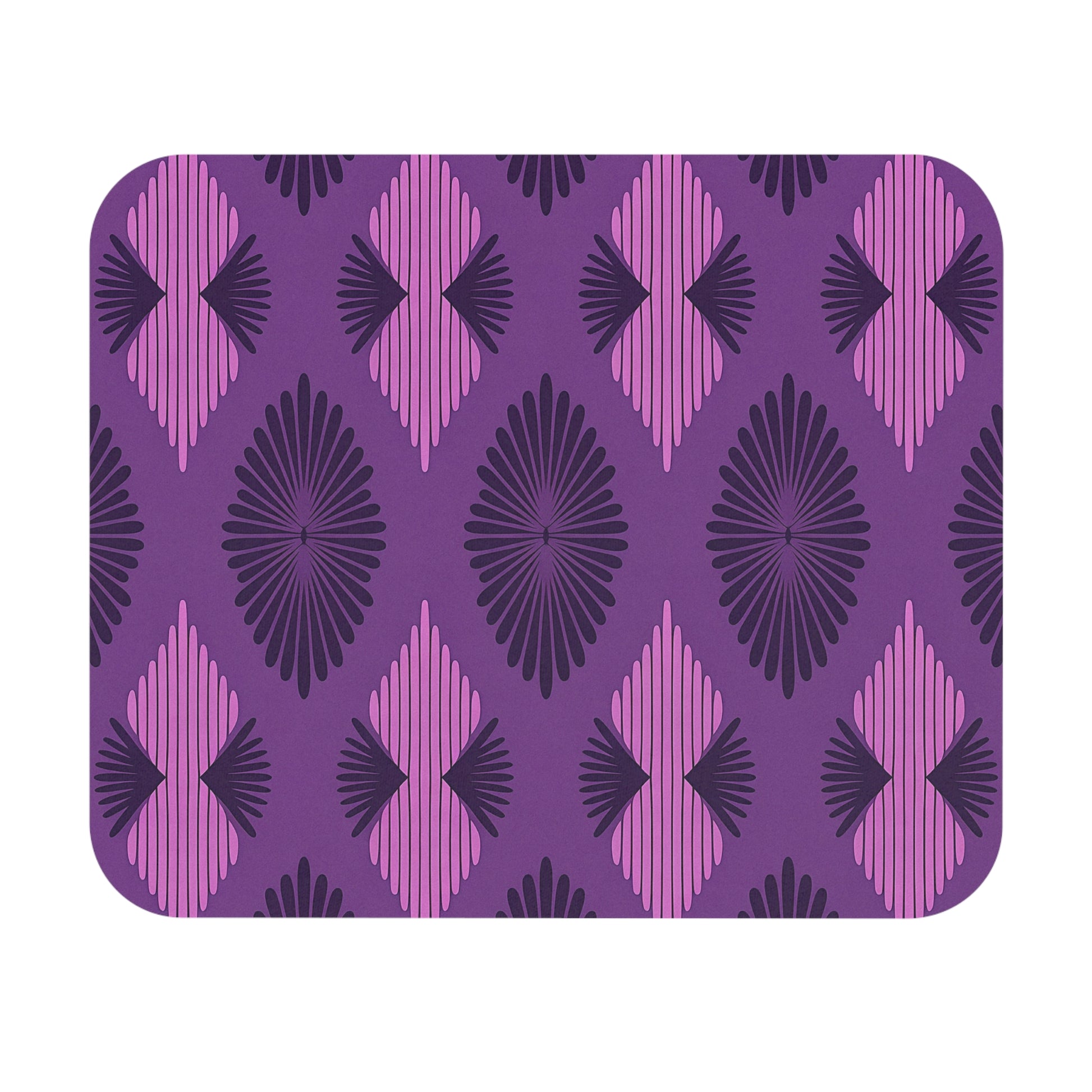 A rectangular mat with rounded corners features a repeating geometric pattern of purple, dark purple, and pink diamond shapes. This African-inspired mouse pad has radiating lines for a bold retro look and a non-slip rubber base for stability.